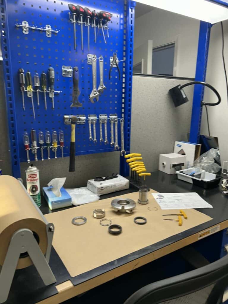 Mechanical seal components laid out for inspection at the DXP Pacific Richmond seal shop