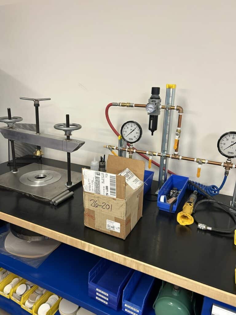Mechanical seal test fixture with pressure gauges at the DXP Richmond seal shop